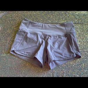 Lululemon lilac 2.5 speed up shorts.